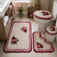 Jogo de banheiro em crochê rosa com aplicações de flores